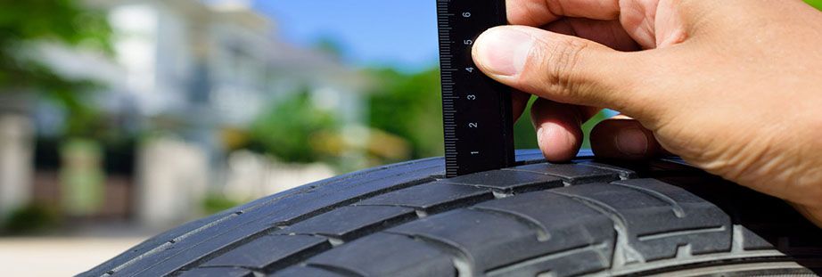 Checking car tyre tread